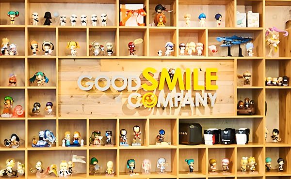 Shelves showing off Good Smile Company figures